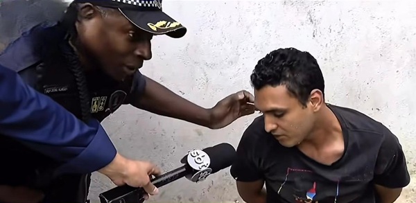 Suspeito preso por tráfico nos Pimentas pede perdão à mãe durante operação da GCM acompanhada pela TV (Foto-Reprodução)